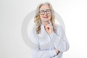 Senior business woman with stylish glasses and wrinkle face isolated on white background. Mature healthy lady. Copy space. Seniors