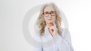 Senior business woman with stylish glasses and wrinkle face  on white background. Mature healthy lady. Copy space. Seniors