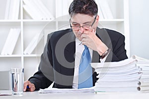 Senior businessman concentrate on work photo