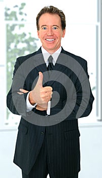 Senior Businessman Give Ok Sign With Hand Gesture