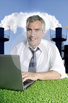 Senior businessman grass smog pollution