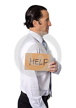 Senior businessman holding help sign in overwork, work stress and exploitation concept