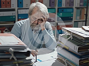 Senior businessman working in the office