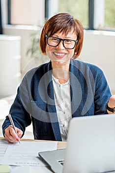 Senior businesswoman at the office