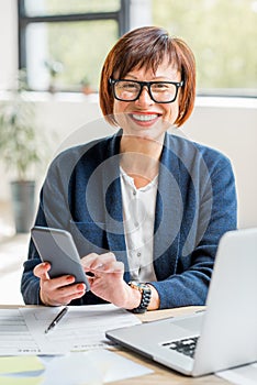 Senior businesswoman at the office