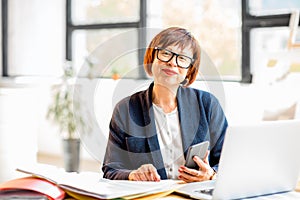 Senior businesswoman at the office