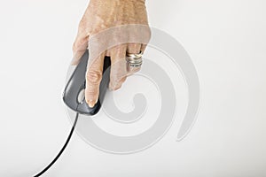 Senior businesswoman's hand using computer mouse