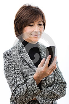 Senior businesswoman using mobile phone