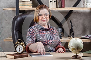 Senior businesswoman working in office