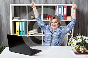 Senior businesswoman working in office