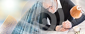 Senior businessman working on document; multiple exposure