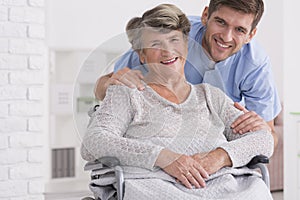 Senior care assistant with disabled woman