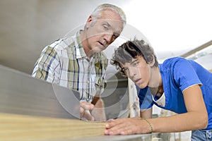 senior carpenter training apprentice
