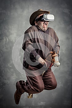 Senior caucasian adult man enjoy experiencing immersive Virtual Reality cowboy game simulation.VR portrait concept with