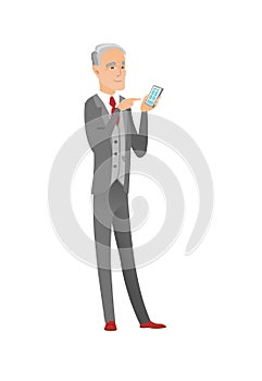 Senior caucasian businessman holding mobile phone.