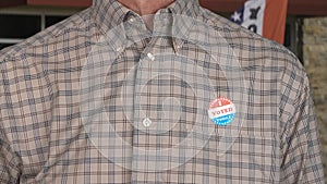 Senior caucasian man in casual clothing with Voted sticker