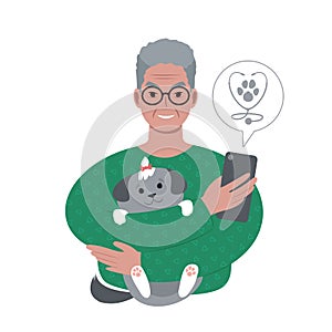 senior caucasian man with a tiny dog searching for veterinarian online from smartphone.
