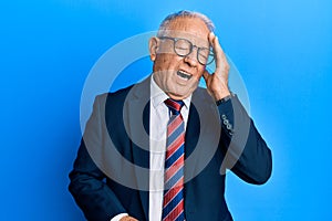 Senior caucasian man wearing business suit and tie yawning tired covering half face, eye and mouth with hand