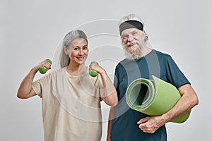 Senior caucasian sports couple looking at camera