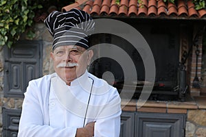 Senior chef in traditional kitchen