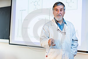 Senior chemistry professor giving a lecture