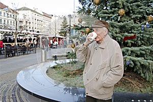 Senior on the christmas market