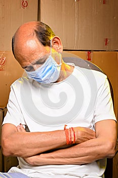 An Indain Senior citizen man with mask COVID time photo