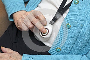 Senior citizen using a panic alarm