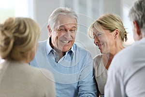 Senior couple attending group therapy