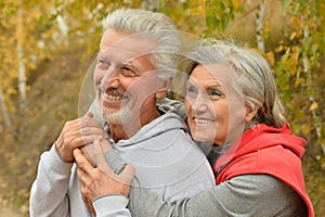 Senior couple in autumn park