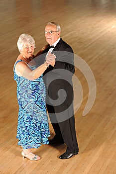 Senior couple ballroom dancing