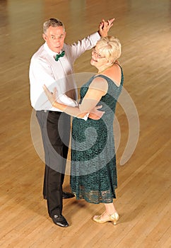 Senior couple ballroom dancing