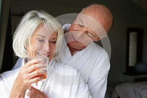 Senior couple in bathrobe