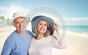 Senior couple on beach.