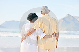 Senior couple at beach, hug and travel, retirement and love outdoor, vacation with ocean view and relax in nature. Peace