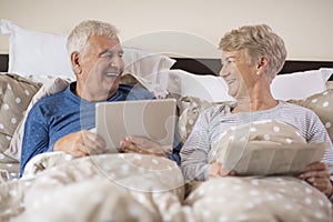 Senior couple in the bed