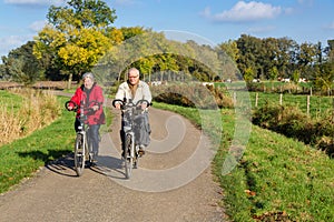 Senior couple on a bicycle