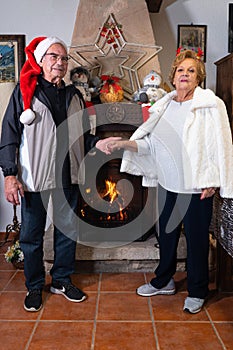 Senior couple celebrating christmas,enjoying these emotional and family holidays photo