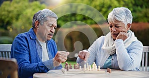Senior couple, chess game or thinking of strategy, plan or mental health for brain power at home. Elderly woman, old man