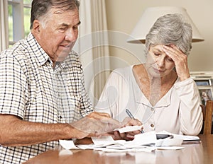 Senior Couple Concerned About Debt Going Through Bills Together