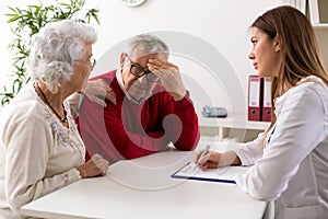 Senior couple on consultation with a doctor