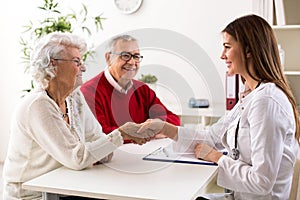 Senior couple on consultation with a doctor, close up