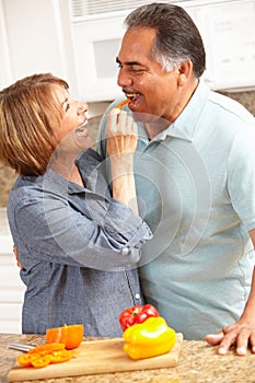 Senior couple cooking