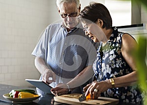 Senior Couple Cooking Food Kitchen