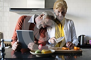 Senior Couple Cooking Food Kitchen