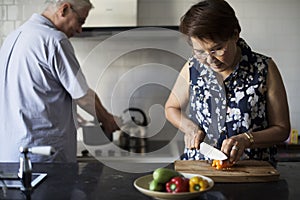 Senior Couple Cooking Food Kitchen