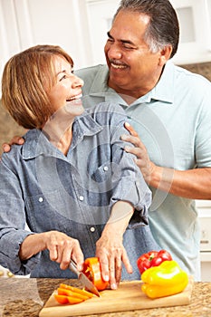 Senior couple cooking together