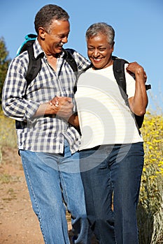 Senior couple on country hike