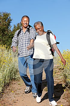 Senior couple on country hike