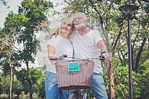Senior couple on cycle ride in countryside